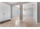 Bright dining room with tile floors and double doors at 630 Sw 210Th Ave, Dunnellon, FL 34431