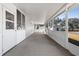 Screened porch with view of the backyard and countryside at 630 Sw 210Th Ave, Dunnellon, FL 34431