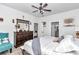 Bedroom featuring a dresser with mirror, and a view towards the living room and bathroom at 7646 Sw 129Th Pl, Ocala, FL 34473