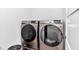 Samsung washer and dryer pair in the laundry room are ready to handle all your laundry needs at 7646 Sw 129Th Pl, Ocala, FL 34473