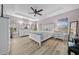 A spacious main bedroom featuring light wood floors and ample natural light from the windows at 8822 Sw 108Th St, Ocala, FL 34481