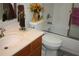 Bathroom with shower/tub combo, sink, and linen at 9662 Sw 97Th Ln, Ocala, FL 34481