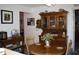 Round dining table with hutch and seating for four at 9662 Sw 97Th Ln, Ocala, FL 34481