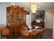 Bright dining room featuring a large wooden hutch at 9662 Sw 97Th Ln, Ocala, FL 34481