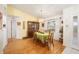 Dining room with a wooden table and light green tablecloth at 10090 Sw 78Th Ct, Ocala, FL 34476