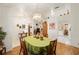 Bright dining area with hardwood floors and a view of the kitchen at 10090 Sw 78Th Ct, Ocala, FL 34476