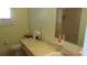 Clean bathroom with a bathtub, sink, and vanity at 10470 Sw 99Th Ave, Ocala, FL 34481