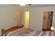 Spacious bedroom with double bed and access to bathroom and closet at 10470 Sw 99Th Ave, Ocala, FL 34481