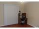 Home office with wood flooring and a desk at 10470 Sw 99Th Ave, Ocala, FL 34481