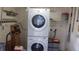 Laundry room with stackable washer and dryer at 10470 Sw 99Th Ave, Ocala, FL 34481