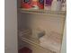 Well-organized linen closet with wire shelving at 10470 Sw 99Th Ave, Ocala, FL 34481