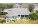 Aerial view of house, showcasing backyard and landscaping at 1105 Se 48Th Ave, Ocala, FL 34471