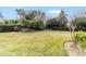 Serene backyard with lush lawn and water feature at 1105 Se 48Th Ave, Ocala, FL 34471