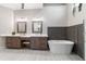 Elegant bathroom with double vanity, soaking tub, and separate shower at 1105 Se 48Th Ave, Ocala, FL 34471