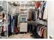 Well-organized walk-in closet with custom shelving and drawers at 1105 Se 48Th Ave, Ocala, FL 34471