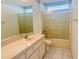 Clean bathroom with shower/tub combo and updated vanity at 11441 Sw 68Th Ct, Ocala, FL 34476