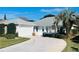 House exterior with driveway and landscaping at 11441 Sw 68Th Ct, Ocala, FL 34476