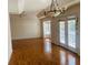 Living room featuring hardwood floors and french doors at 11441 Sw 68Th Ct, Ocala, FL 34476