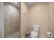 Clean bathroom with a shower and toilet at 13076 Sw 38Th Ter, Ocala, FL 34473