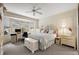 Main bedroom with bay window, desk area, and ample closet space at 13309 Se 92Nd Court Rd, Summerfield, FL 34491