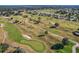 Aerial view of the golf course showcasing its layout at 13309 Se 92Nd Court Rd, Summerfield, FL 34491