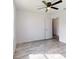 Bedroom with ceiling fan and access to other rooms at 15551 Sw 150Th Pl, Ocala, FL 34481