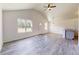 Open living area with high ceilings and wood-look floors at 15551 Sw 150Th Pl, Ocala, FL 34481