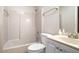 Clean bathroom with a tub, toilet and vanity with a countertop at 1903 Se 37Th Court Cir, Ocala, FL 34471