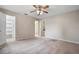 Bright bedroom featuring a walk-in closet and access to a hallway at 1903 Se 37Th Court Cir, Ocala, FL 34471