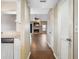 Hallway with wood-look floors leading to the living room at 1903 Se 37Th Court Cir, Ocala, FL 34471