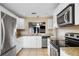 Modern kitchen featuring stainless steel appliances and granite countertops at 1903 Se 37Th Court Cir, Ocala, FL 34471