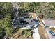 Aerial view of house, showing backyard, pool, and solar panels at 19173 St Benedict Dr, Dunnellon, FL 34432