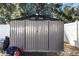 Metal storage shed in backyard at 19173 St Benedict Dr, Dunnellon, FL 34432