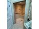 Large walk-in shower with tiled walls and bench seat at 2011 Se Twin Bridge Cir, Ocala, FL 34471