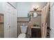 Small bathroom with shower/tub combo and updated vanity at 2011 Se Twin Bridge Cir, Ocala, FL 34471