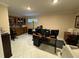 Spacious home office with built-in shelving and ample workspace at 2011 Se Twin Bridge Cir, Ocala, FL 34471