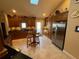 Well-equipped kitchen with stainless steel appliances and island at 2011 Se Twin Bridge Cir, Ocala, FL 34471