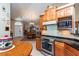 Spacious kitchen featuring granite countertops and stainless steel appliances at 2011 Se Twin Bridge Cir, Ocala, FL 34471