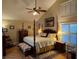 Main bedroom features high ceilings and a ceiling fan at 2011 Se Twin Bridge Cir, Ocala, FL 34471