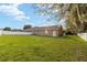 Large grassy backyard with fenced perimeter at 3819 Se 38Th Loop, Ocala, FL 34480