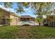 Landscaped backyard with a view of the pool at 3819 Se 38Th Loop, Ocala, FL 34480