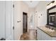 Bathroom with granite countertop and glass shower enclosure at 3819 Se 38Th Loop, Ocala, FL 34480