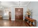 Bright entryway with hardwood floors and elegant double doors at 3819 Se 38Th Loop, Ocala, FL 34480