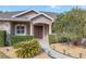 Front entrance with walkway and lush landscaping at 3819 Se 38Th Loop, Ocala, FL 34480