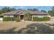 Tan house with stone accents and manicured lawn at 3819 Se 38Th Loop, Ocala, FL 34480