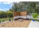 Charming backyard fire pit area with wooden seating at 3819 Se 38Th Loop, Ocala, FL 34480