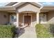 Welcoming front porch with double doors and stone accents at 3819 Se 38Th Loop, Ocala, FL 34480