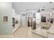 White kitchen with stainless steel appliances and granite counters at 3819 Se 38Th Loop, Ocala, FL 34480