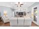 Bright living room featuring hardwood floors, neutral walls, and ample seating at 3819 Se 38Th Loop, Ocala, FL 34480