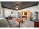 Home office with wood-paneled feature wall and built-in shelving at 3819 Se 38Th Loop, Ocala, FL 34480